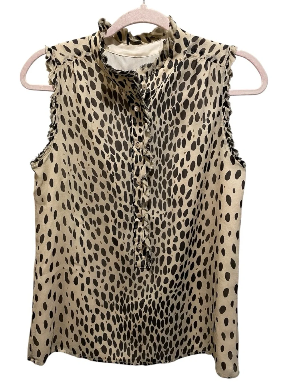 J.Crew silk blouse features a sleeveless design and a cheetah print. Size 2.